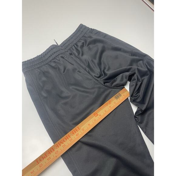 Under Armour Women’s Large OutRun The Storm Black Reflective Athletic Track Pant - Picture 11 of 15